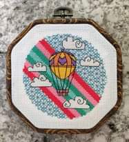 Cross stitch designs – balloon in the clouds