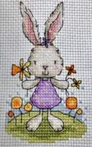 Bunny with flowers cross stitch design